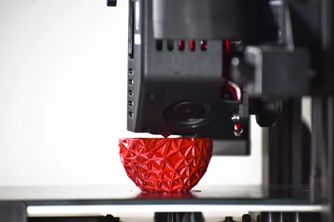 Timelapse of a 3d printer printing a red polygonal egg Stock Footage 212616378