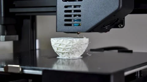 Timelapse of a 3d printer printing a white polygonal egg Stock Footage 237221329