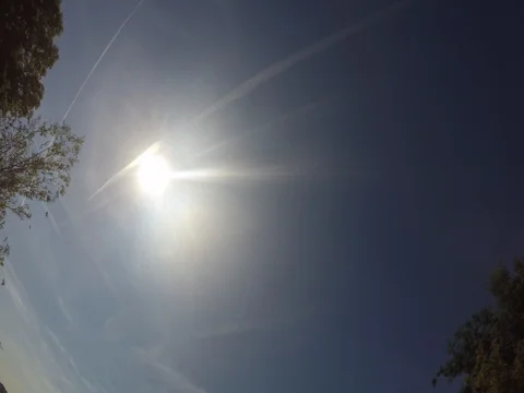 Timelapse 4K Bright sky midday sun Stock Footage 77677425