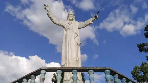 Timelapse 4k of the statue of christ the king with a wonderful deep blue sky Stock Footage 159687092