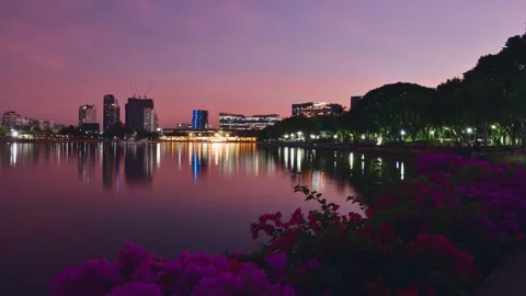 Timelapse 4k sunset in famous attraction - Benjakitti Park with skyline ref.. Stock Footage 308394448