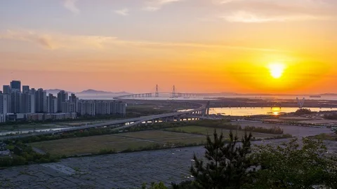 Timelapse 4k .Sunset of incheon bridge at Songdo Central Park,South Korea Stock Footage 114686122