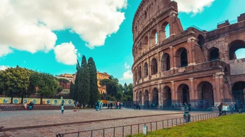 Timelapse 4K, wide view of the famous Coliseum, or Colosseum, during a sunny day Stock Footage 155249437