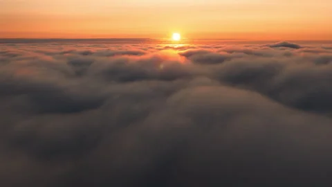 Timelapse above high altitude clouds at sunrise Stock Footage 258268973