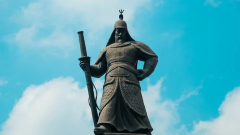 Timelapse of Admiral Yi Sun-sin Monument at Gwanghwamun Square in Seoul, South Stock Footage 90457863