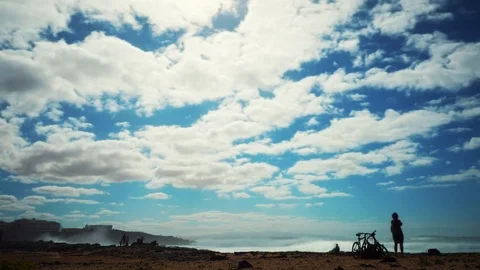Timelapse Aerial Of Clouds Rolling Over People And Beach Stock Footage 72411349