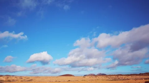 Timelapse Aerial Shot Of Clouds Rolling Over Landscape Stock Footage 72379007