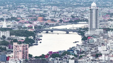 Timelapse of aerial view of Bangkok city over Chao Phraya River Stock Footage 136481053