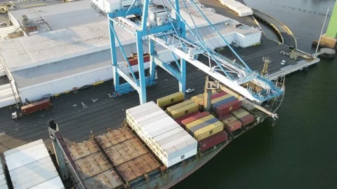 Timelapse Aerial View of Cargo Containers being Removed from Ship Stock Footage 163780411