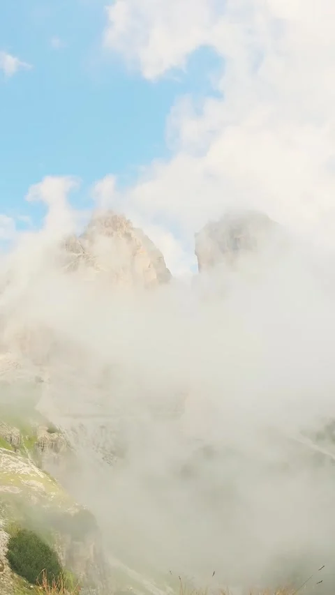 Timelapse aerial view dramatic fog and clouds after rain swirls around the .. Stock Footage 331983095