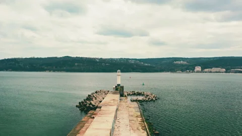 Timelapse aerial view of the lighthouse at cloudy weather, black sea, Bulgaria Stock Footage 237702886
