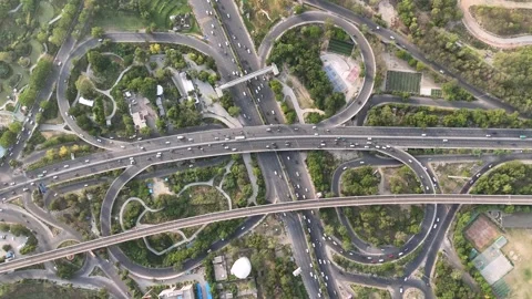Timelapse Aerial View of Mahamaya Flyover and Noida Metro Line in Noida India Stock Footage 335389595