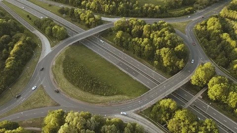 Timelapse Aerial View of a Motorway Intersection during Sunset Stock Footage 111991748