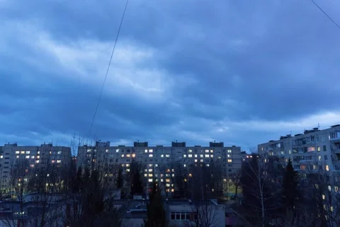 Timelapse against the background of gray panel houses. Stock Footage 130507473