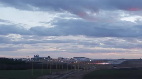 Timelapse airplane landing to Helsinki Vantaa airport in sunset Stock Footage