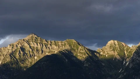 Timelapse of alps at sunset with clouds in the sky Stock-Footage 123792869
