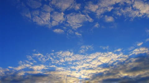 Timelapse altocumulus clouds in evening sunset sky Stock Footage 887620