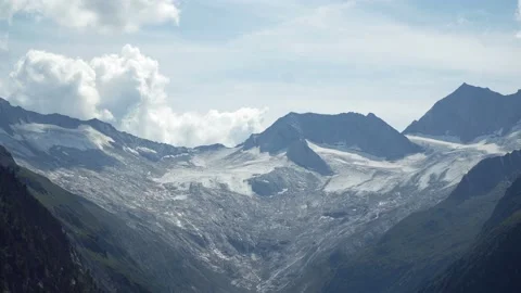 Timelapse of Amazing landscape of massive snow-capped mountain peaks Stock Footage 121343373