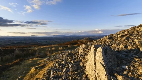 Timelapse of Ancient Prehistoric Tomb Stone Structure with Moving Clouds Ireland Stock Footage 101095219