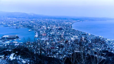 Timelapse and aerial view of Hakodate cityscape with ropeway up and down, Japan Stock-Footage 106944374