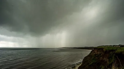 Timelapse of approaching storm over coastal cliffs. 스톡 동영상 109791284