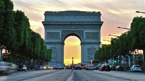 Timelapse of Arc De Triumph with sunset behind, seen from Champs Elysees Stock Footage 46813296