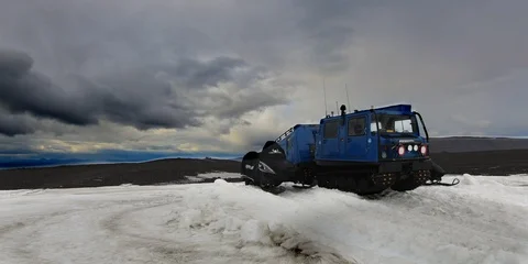 Timelapse of an Arctic Vehicle with dramatic clouds in the background 動画素材 94741762