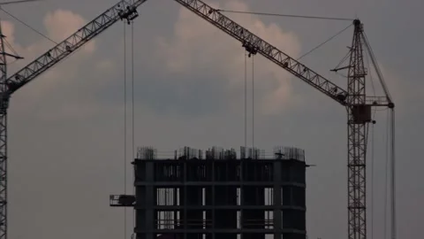 Timelapse. The Art of Crane Work in Construction Stock Footage 315474567
