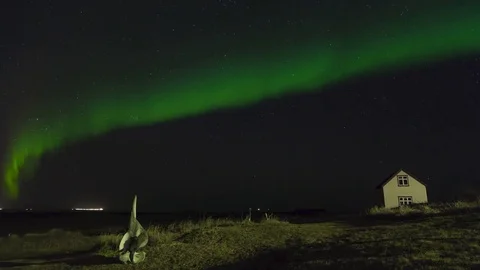Timelapse of aurora borealis moving over the landscape at night Stock Footage 73010846