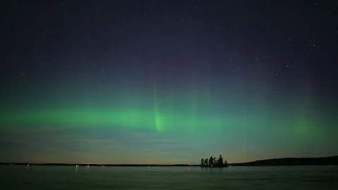 Timelapse of aurora borealis over a big like Stock Footage 185447227