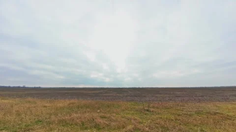Timelapse in the autumn field, cloudy Stock Footage 261287539