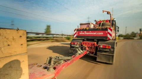 Timelapse Backside View Red Truck Transports Metal Tower Stock Footage 78057757