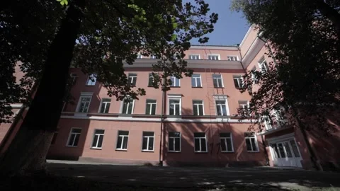 Timelapse of the backyard of the old university building on a sunny day Stock Footage 147485527