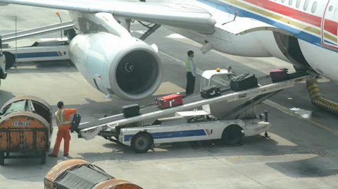 Timelapse of baggage loading, airplane in Shanghai airport, Asia Stock Footage 37700612