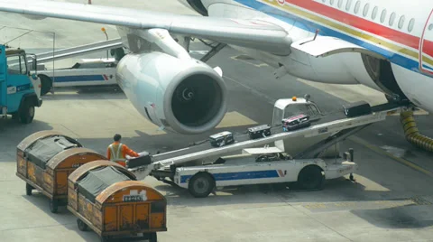 Timelapse of baggage loading, airplane in Shanghai airport Stock Footage 39797976