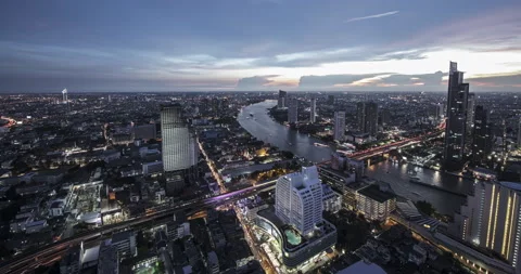 Timelapse of Bangkok rooftops with sunset day to night Video stock 153069304