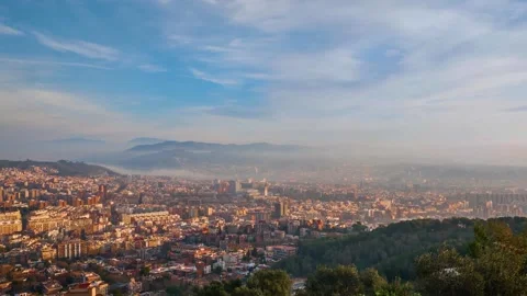 Timelapse of Barelona view from the hill clouds between the mountains Stock Footage 295565509