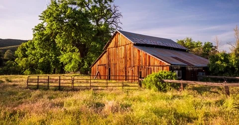 Timelapse of Barn with Moving Clouds 4K Stock Footage 81538239