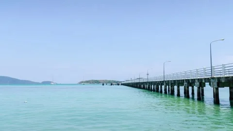 Timelapse beach concrete pier over turquoise clear blue sea in Phuket islan.. Stock Footage 264085487