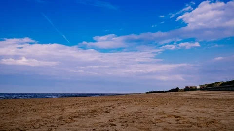 Timelapse of beach in Cuxhaven during cloudy sky Stock Footage 89821748