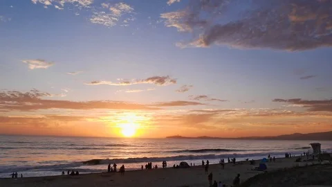 Timelapse of beach sunset over half moon bay 動画素材 79548610