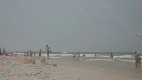 Timelapse of beach, water and lighthouse in Slog2 Stock Footage 99058199