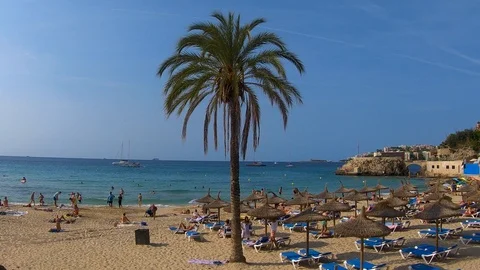 Timelapse of a beach where many baths from mallorca Stock Footage 122356934