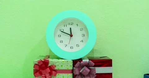 Timelapse of beautiful Alarm Clock on gift box Background, Alarm Clock Face in T Stock Footage 219186227