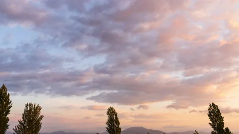 Timelapse of beautiful clouds in the sky at golden hour. Stock Footage 149197065