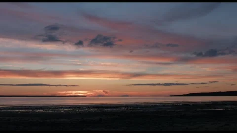 Timelapse of beautiful clouds in sunset sky over lake Stock Footage 95174712