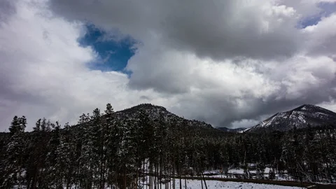 Timelapse - Beautiful cloudscape over the mountains Stock Footage 234835487