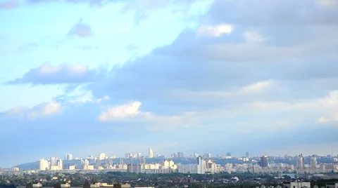Timelapse. Beautiful cumulus clouds and shadows move over Kiev Stock Footage 50076403