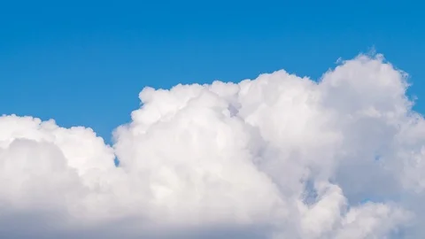 Timelapse of the beautiful Cumulus clouds on a sunny summer day with blue sky Stock Footage 120286305