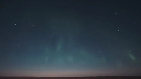 A timelapse of the beautiful display of the pale lights of the aurora on Stock Footage 168788754